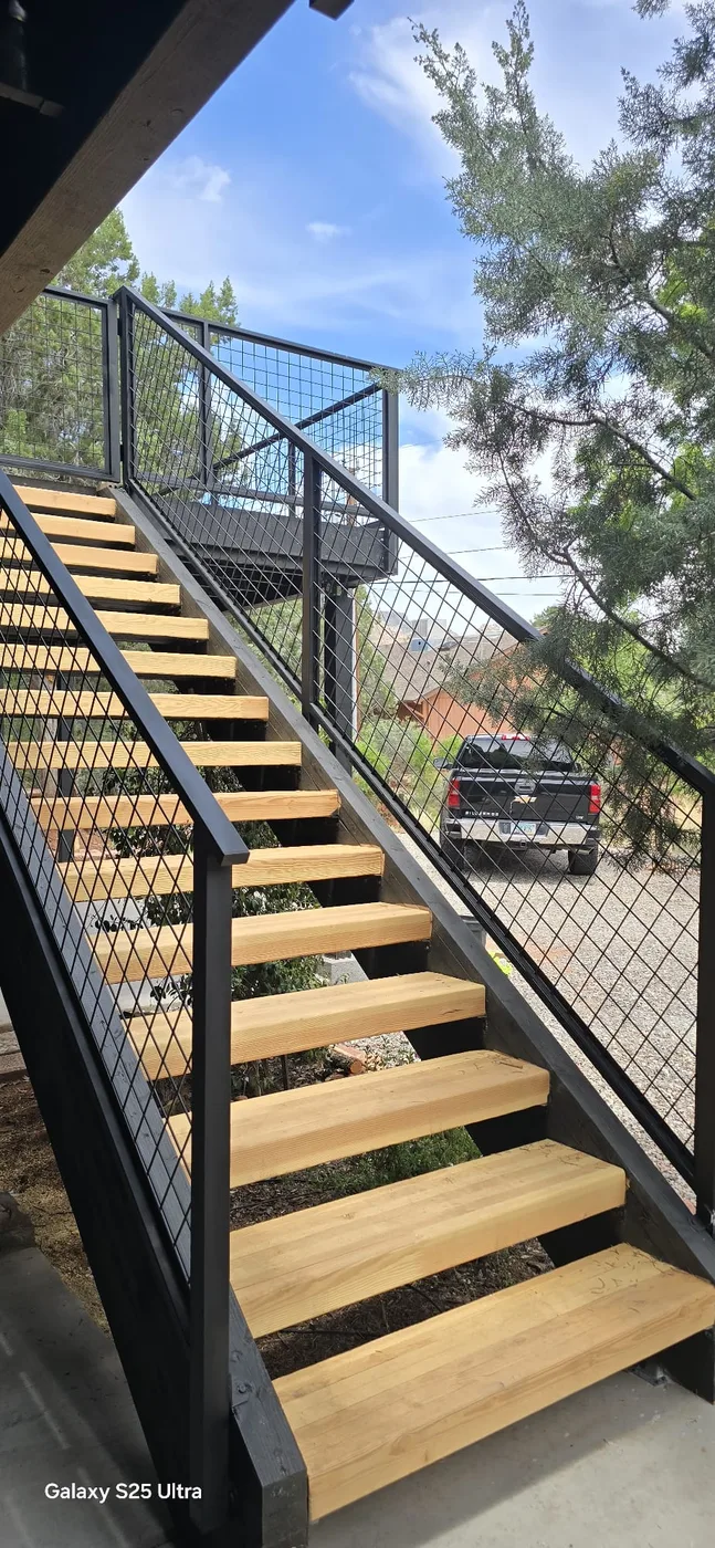 Welded steel stairs with wood treads