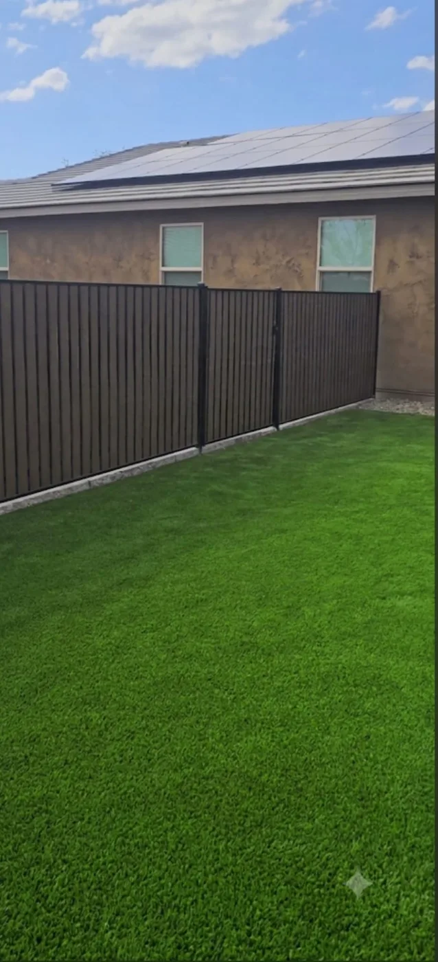 Finished backyard with new fence and turf